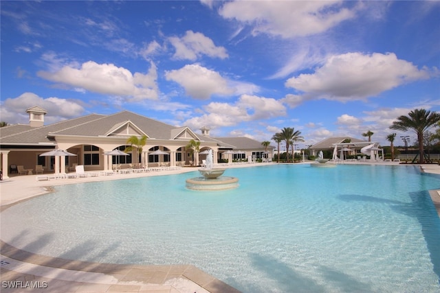 view of swimming pool with a patio area