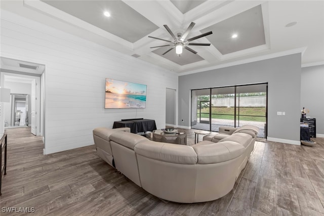 living room featuring ornamental molding, coffered ceiling, hardwood / wood-style floors, and ceiling fan