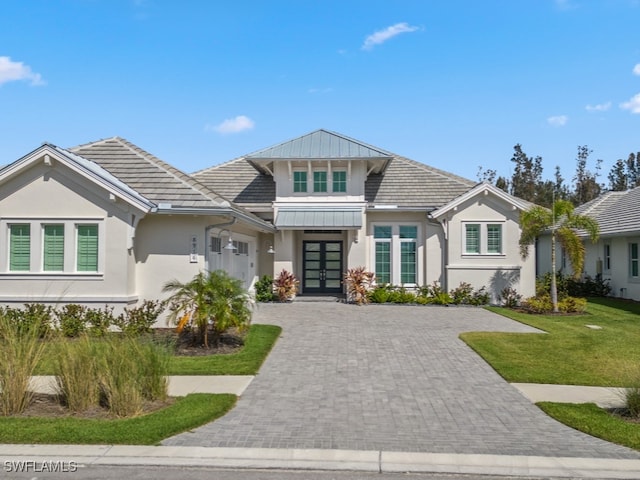 view of front of home featuring a front lawn