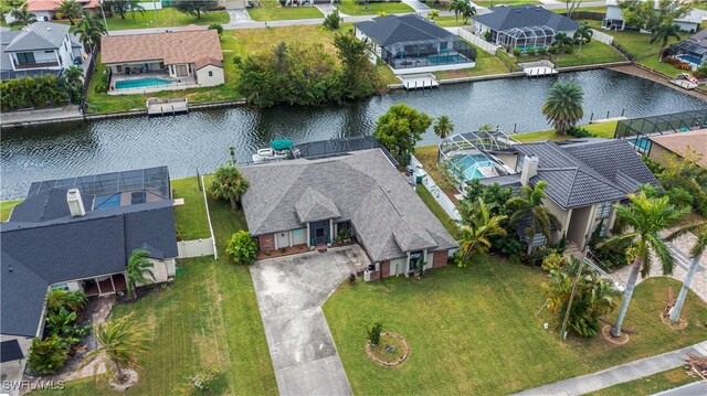 bird's eye view with a water view