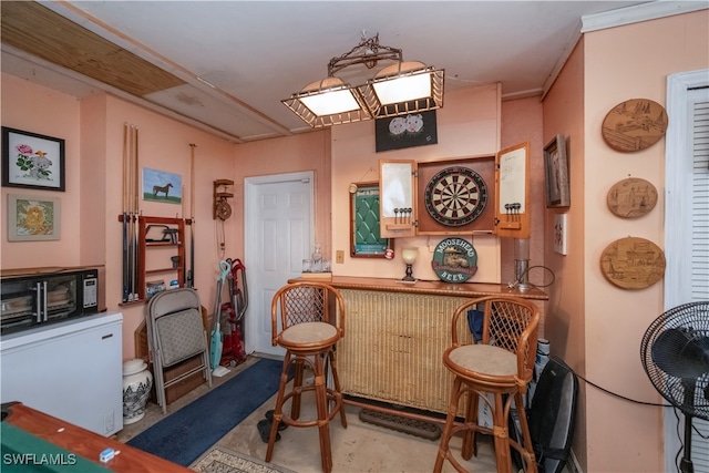 bar featuring refrigerator