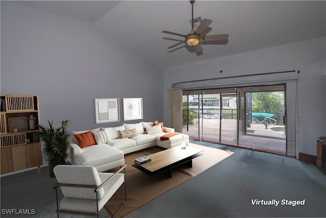 carpeted living room with lofted ceiling and ceiling fan