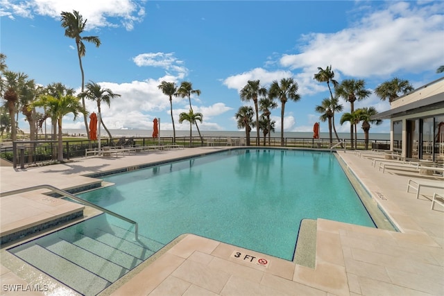 view of pool featuring a patio