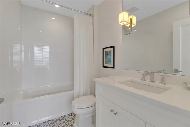 full bathroom featuring vanity, shower / bath combo with shower curtain, toilet, and tile patterned flooring