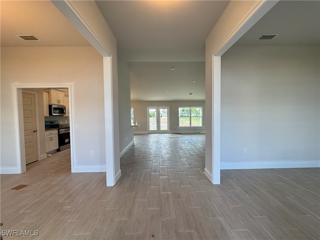 hall featuring light hardwood / wood-style flooring