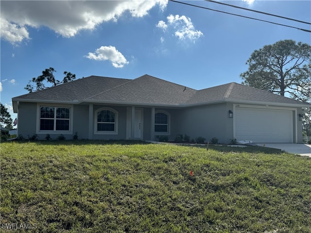 ranch-style home with a front lawn and a garage