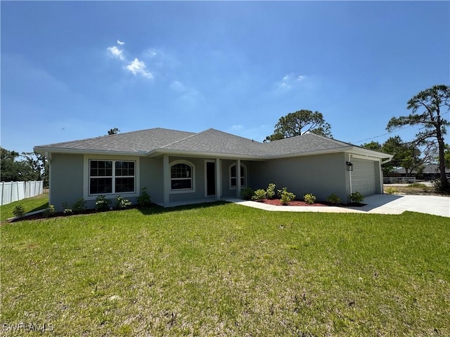 2324 Jacaranda Pkwy W, Cape Coral, FL 33993 - ranch-style house featuring fence, a front lawn, a garage, stucco siding, and driveway