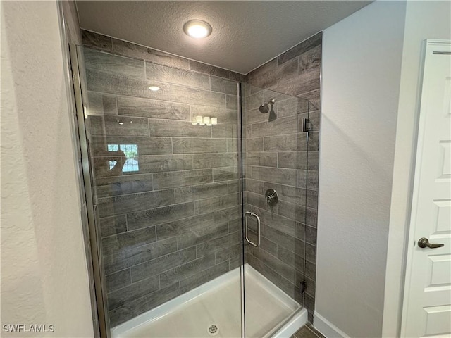 2324 Jacaranda Pkwy W, Cape Coral, FL 33993 - full bath with a textured ceiling and a shower stall