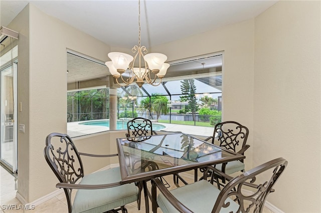 tiled dining space with an inviting chandelier