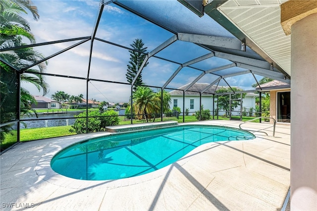 view of pool with a patio, a lanai, and a water view