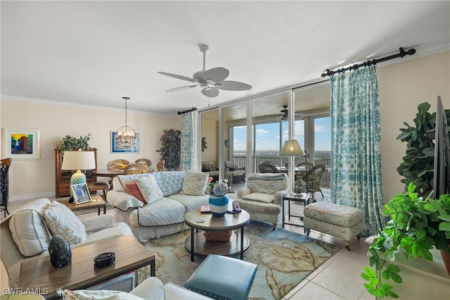 tiled living room featuring crown molding, a wall of windows, and ceiling fan with notable chandelier