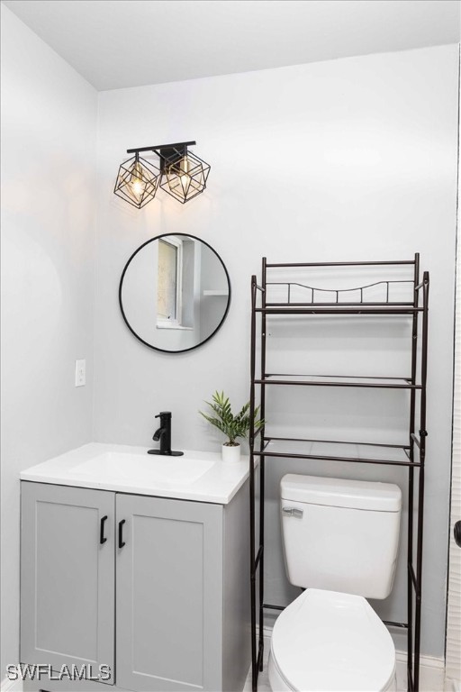 bathroom with vanity and toilet