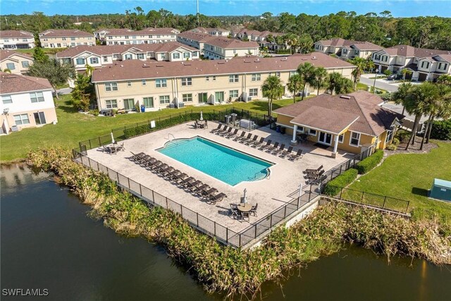 15050 Caspian Tern Ct Unit 102, North Fort Myers, FL 33917 - aerial view featuring a water view and a residential view