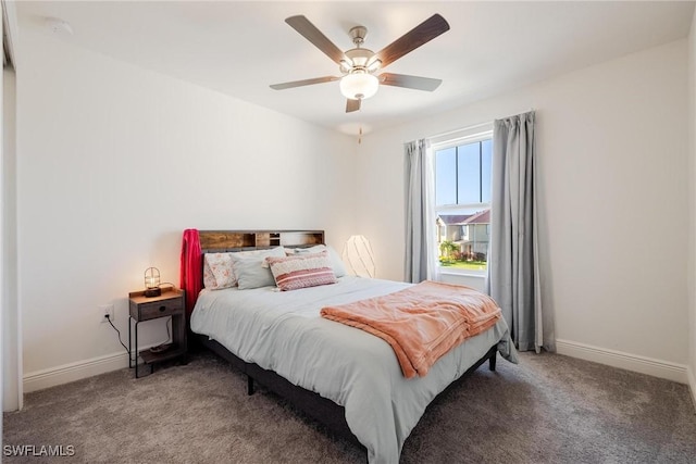 15050 Caspian Tern Ct Unit 102, North Fort Myers, FL 33917 - bedroom featuring light colored carpet, baseboards, and ceiling fan