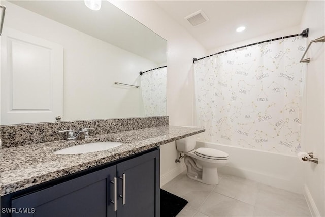 15050 Caspian Tern Ct Unit 102, North Fort Myers, FL 33917 - full bathroom featuring toilet, vanity, tile patterned floors, shower / bath combination with curtain, and baseboards