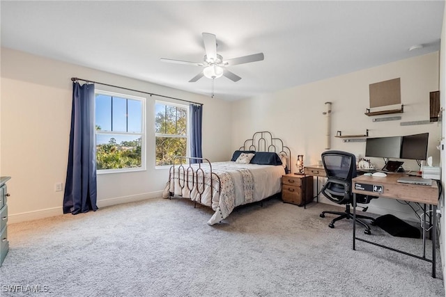 15050 Caspian Tern Ct Unit 102, North Fort Myers, FL 33917 - carpeted bedroom with baseboards and ceiling fan