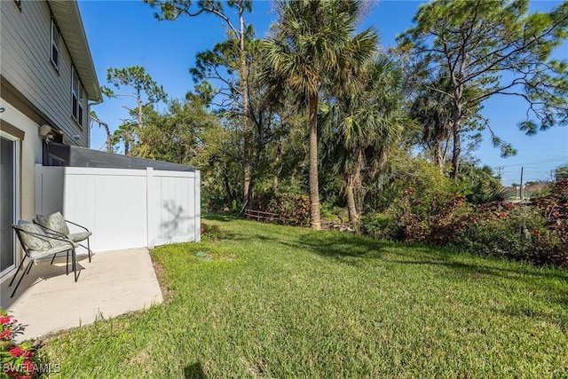 15050 Caspian Tern Ct Unit 102, North Fort Myers, FL 33917 - view of yard featuring a patio area and fence