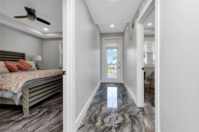 interior space featuring ceiling fan