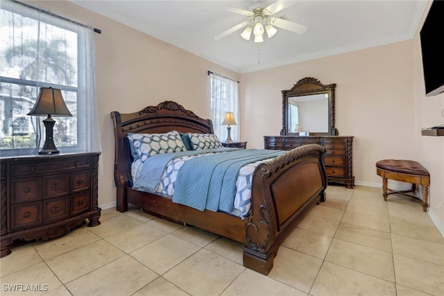 bedroom featuring light tile patterned floors, ceiling fan, and crown molding