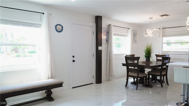 dining space with a healthy amount of sunlight