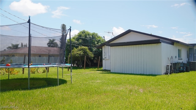 view of yard featuring a trampoline