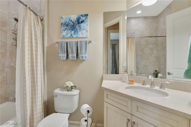 full bathroom featuring toilet, vanity, and shower / bath combination with curtain