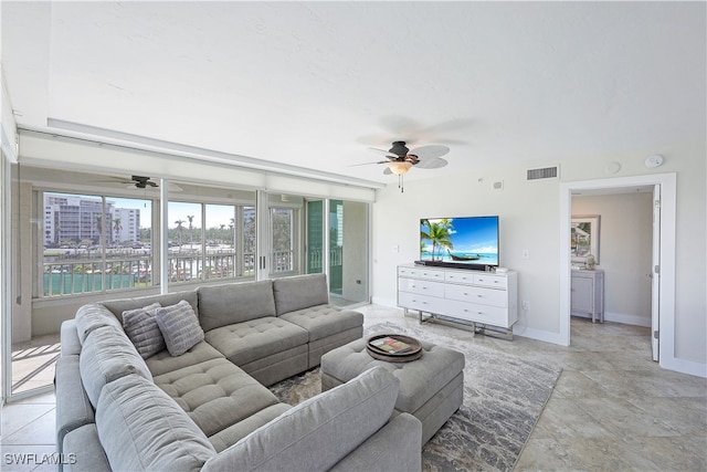 living room with ceiling fan