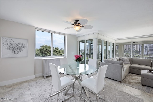 dining room featuring ceiling fan