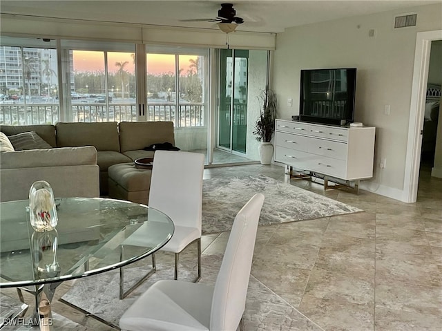 living room with ceiling fan