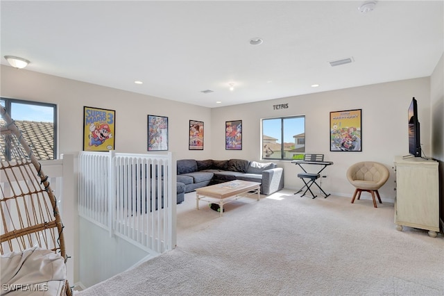 living room with light colored carpet