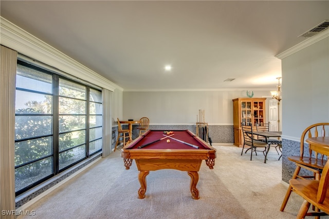 recreation room with crown molding, pool table, and light colored carpet