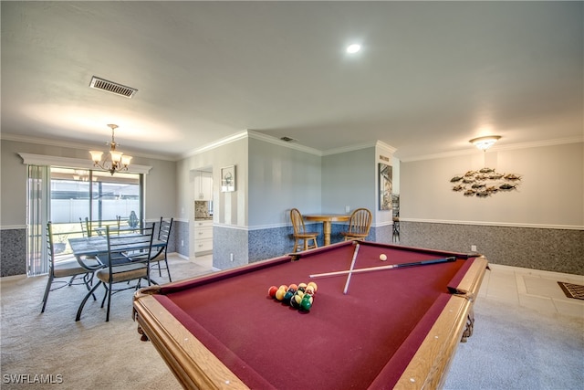 recreation room featuring pool table, an inviting chandelier, and ornamental molding