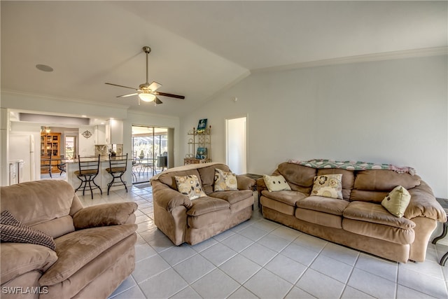 living room featuring ceiling fan, crown molding, lofted ceiling, and light tile patterned floors