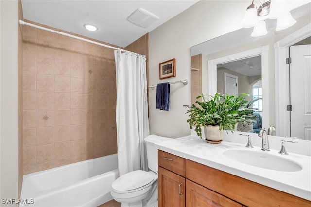 full bathroom with toilet, vanity, and shower / bathtub combination with curtain