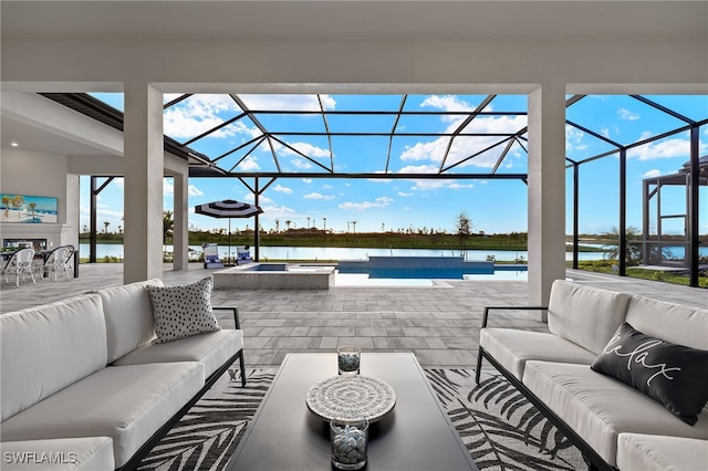 view of patio featuring an outdoor hangout area, an in ground hot tub, a water view, and an outdoor pool