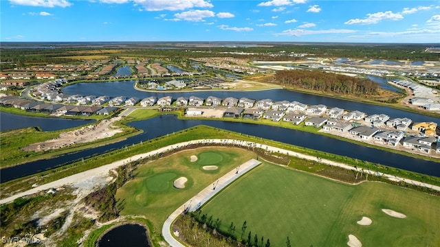 aerial view with a residential view and a water view