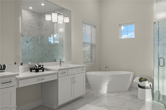 bathroom featuring a marble finish shower, recessed lighting, a freestanding tub, vanity, and marble finish floor