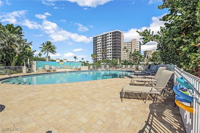 view of pool featuring a patio area