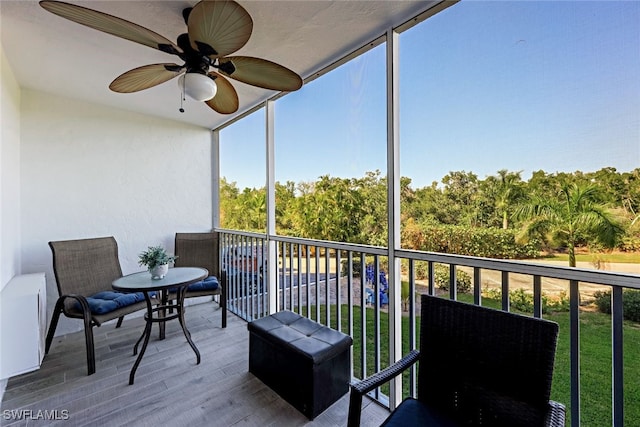balcony featuring ceiling fan