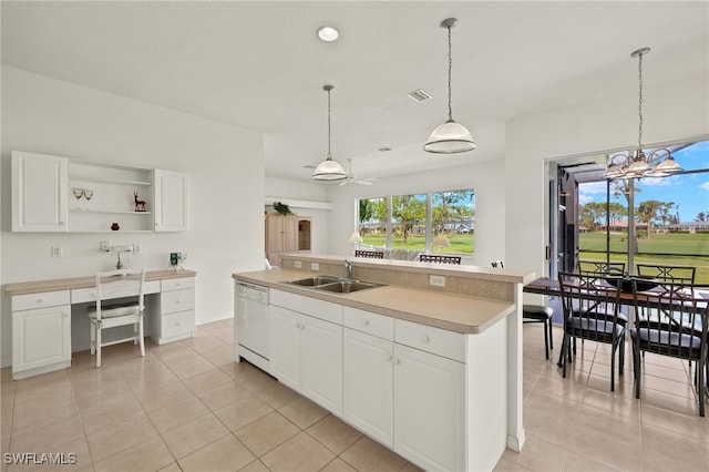 kitchen with visible vents, white dishwasher, a sink, and light tile patterned floors