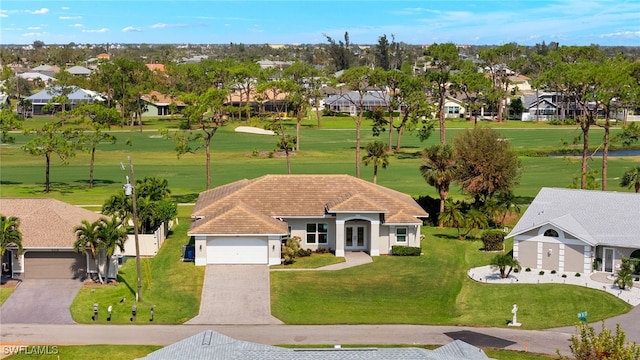 bird's eye view featuring a residential view and golf course view
