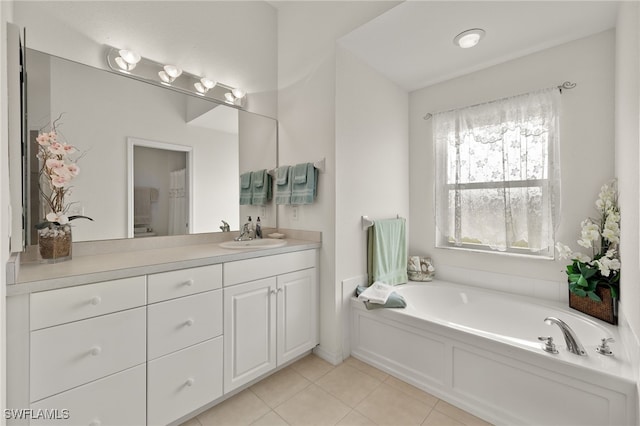 full bath with a garden tub, tile patterned flooring, and vanity