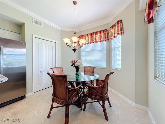 dining space with ornamental molding, a notable chandelier, and light tile patterned floors