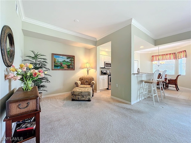 sitting room featuring light carpet, crown molding, and sink