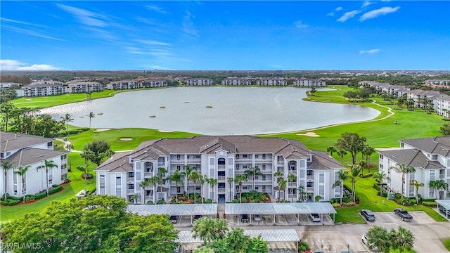 drone / aerial view with a water view