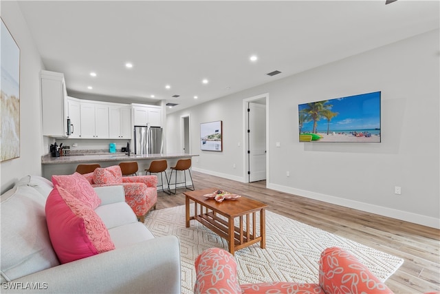 living room with light wood-type flooring