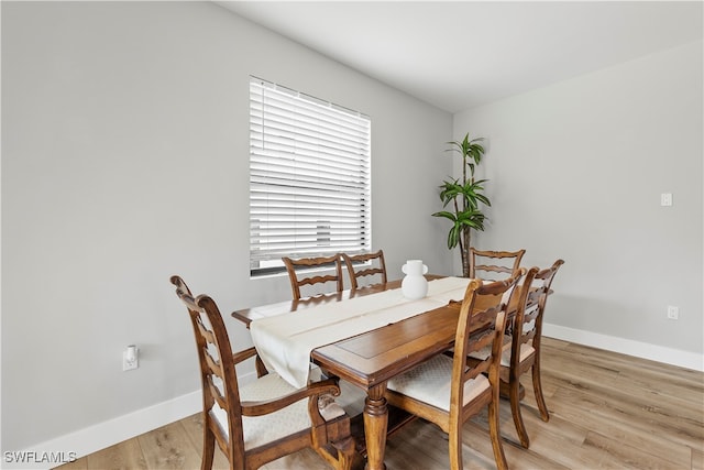 dining space featuring light hardwood / wood-style flooring