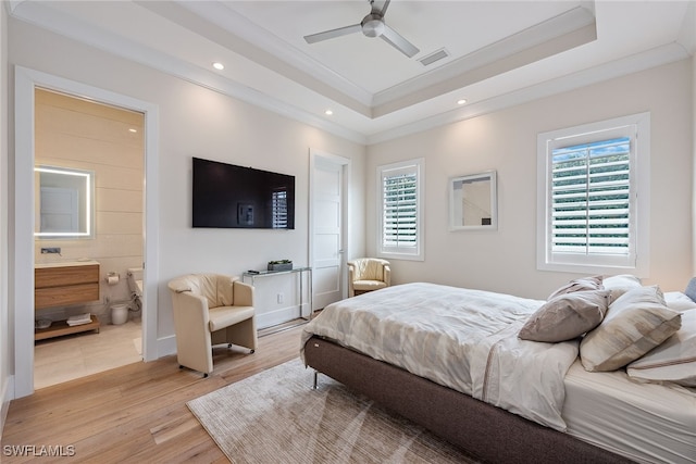 bedroom with light hardwood / wood-style flooring, ceiling fan, ornamental molding, and multiple windows