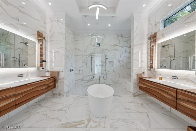 bathroom featuring tile walls, vanity, independent shower and bath, and ornamental molding