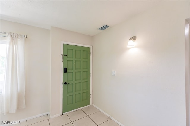 view of tiled foyer entrance